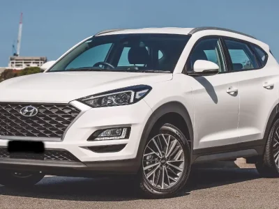 Witte Hyundai Tucson voorkant schuin